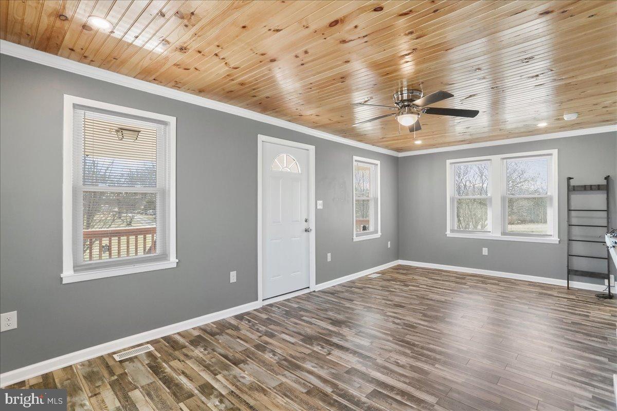 17 Turkey Hl Road Augusta, WV 26704 - Photo 16 of 33 a bedroom with bed and wooden floor