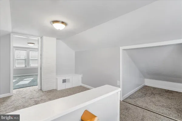 a bathroom with a sink and a shower