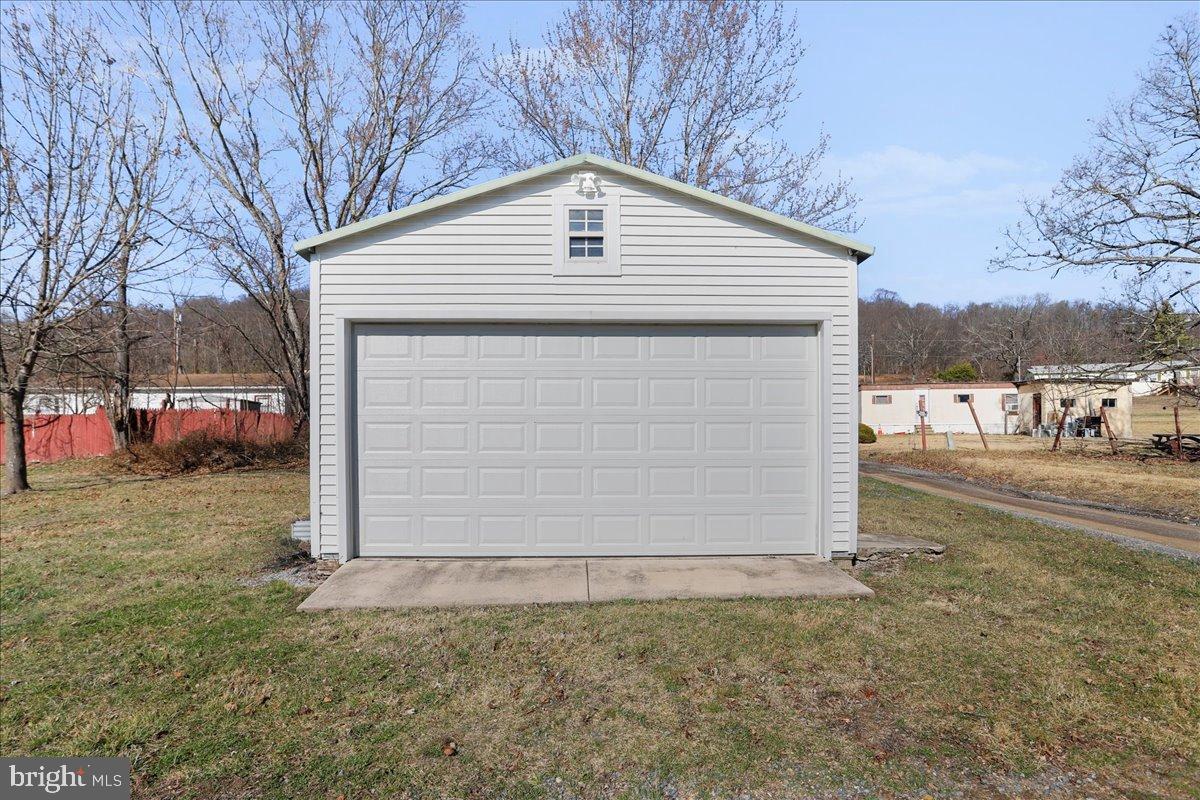 17 Turkey Hl Road Augusta, WV 26704 - Photo 28 of 33 a front view of a house with a yard