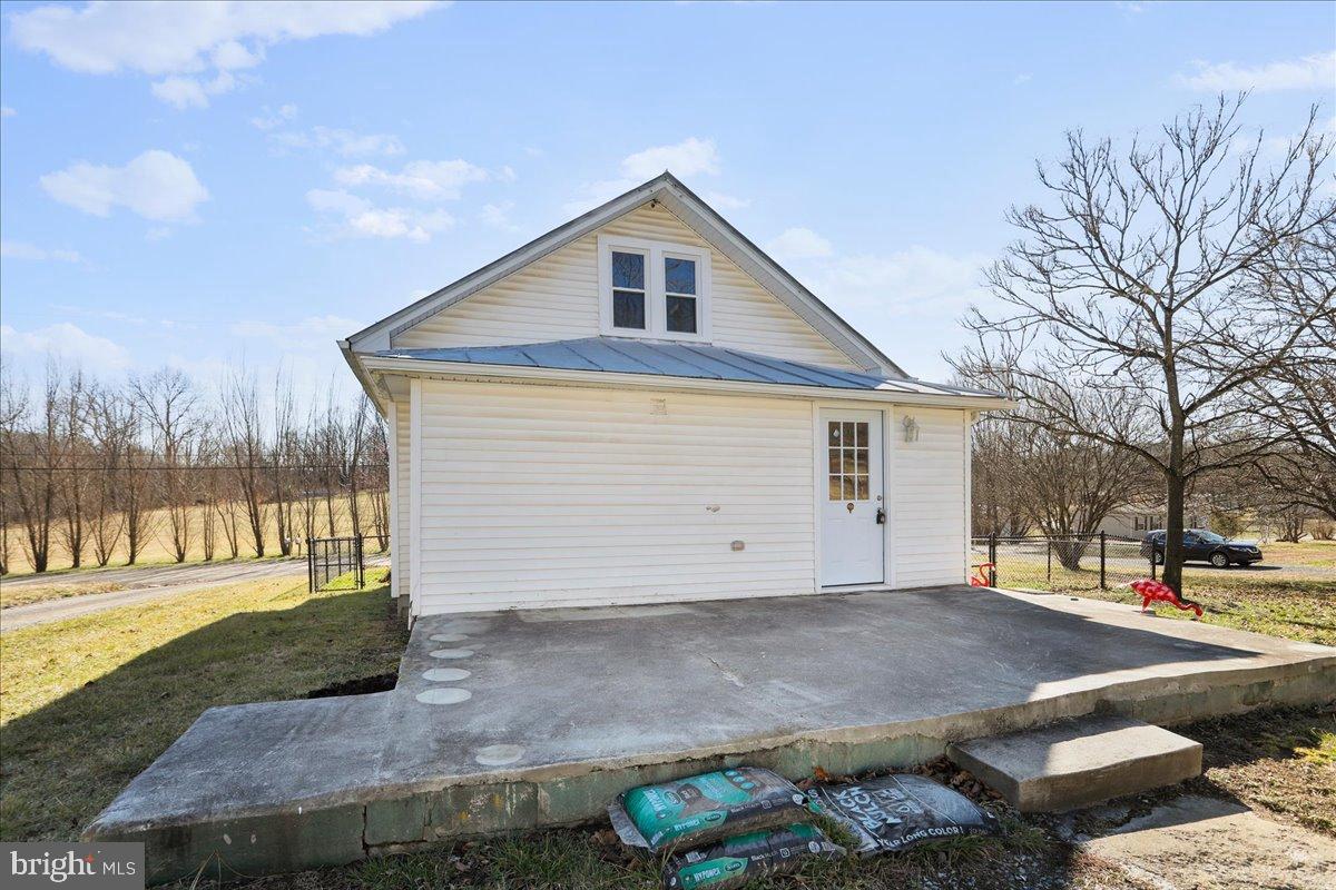 17 Turkey Hl Road Augusta, WV 26704 - Photo 30 of 33 a front view of a house with a yard