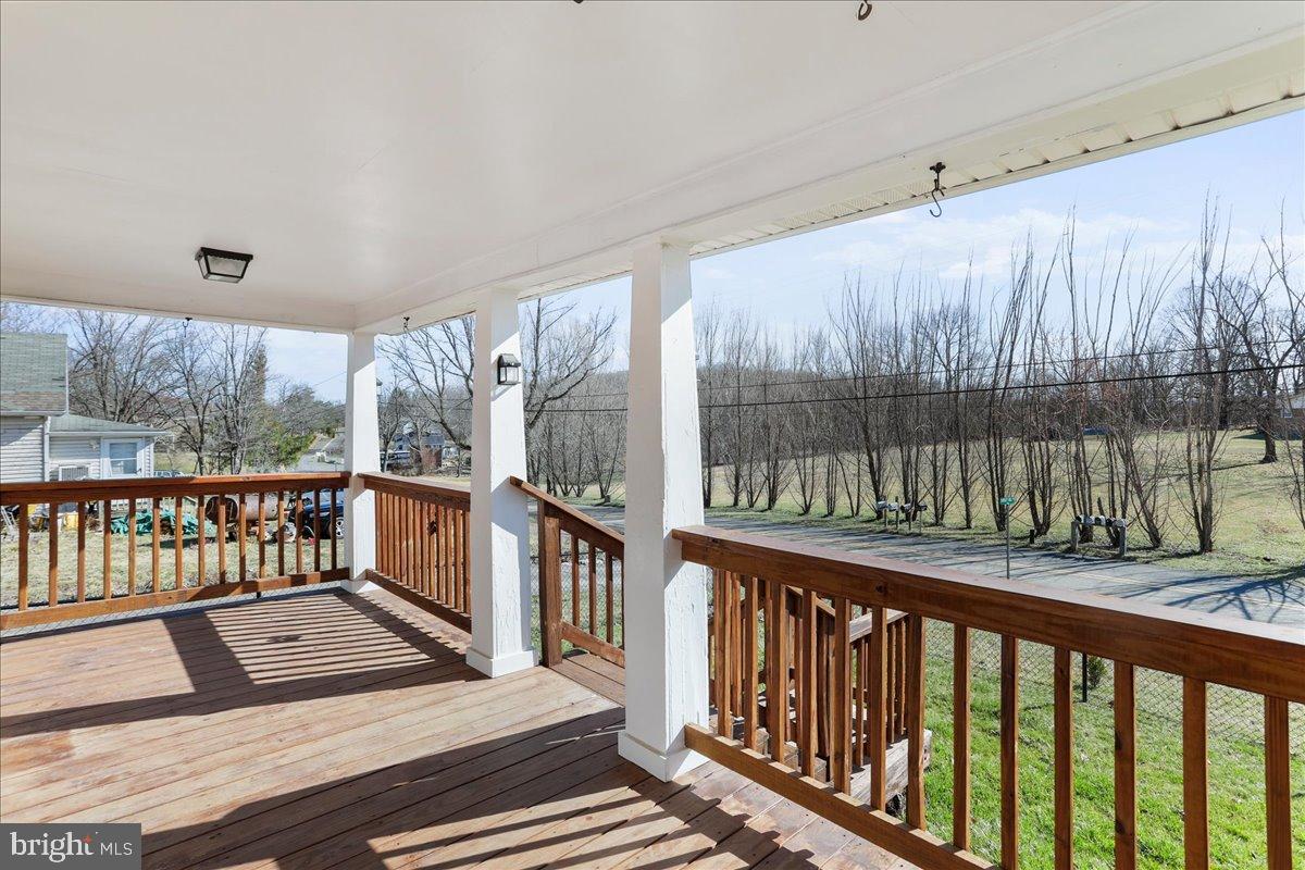 17 Turkey Hl Road Augusta, WV 26704 - Photo 3 of 33 a view of a two chairs in the balcony