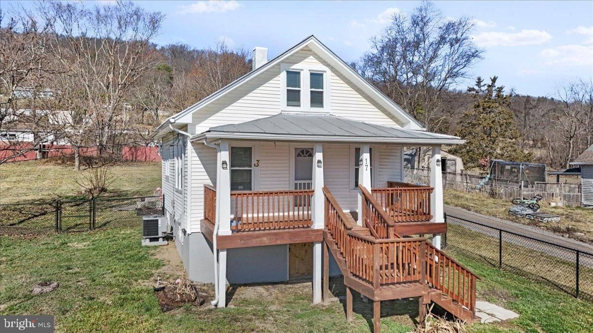 17 Turkey Hl Road Augusta, WV 26704 - Photo 4 of 33 a front view of a house with garden