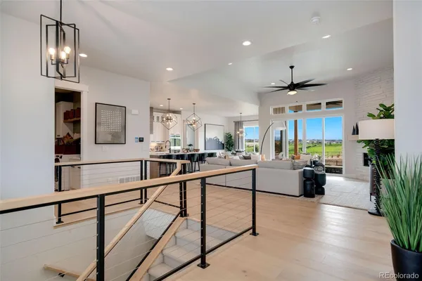 a view of a living room kitchen and dining room