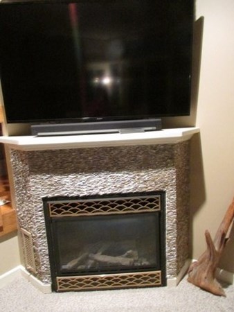59 Oceanside Drive, Unit 59 Hull, MA 02045 - Photo 13 of 29 a stove top oven sitting inside of a kitchen