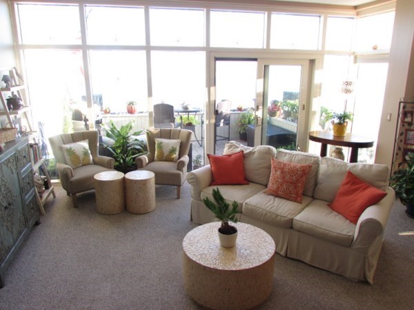 59 Oceanside Drive, Unit 59 Hull, MA 02045 - Photo 10 of 29 a living room with furniture and a large window