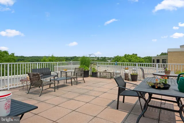a view of a chairs and table on the terrace