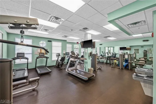 a room with lots of gym equipment