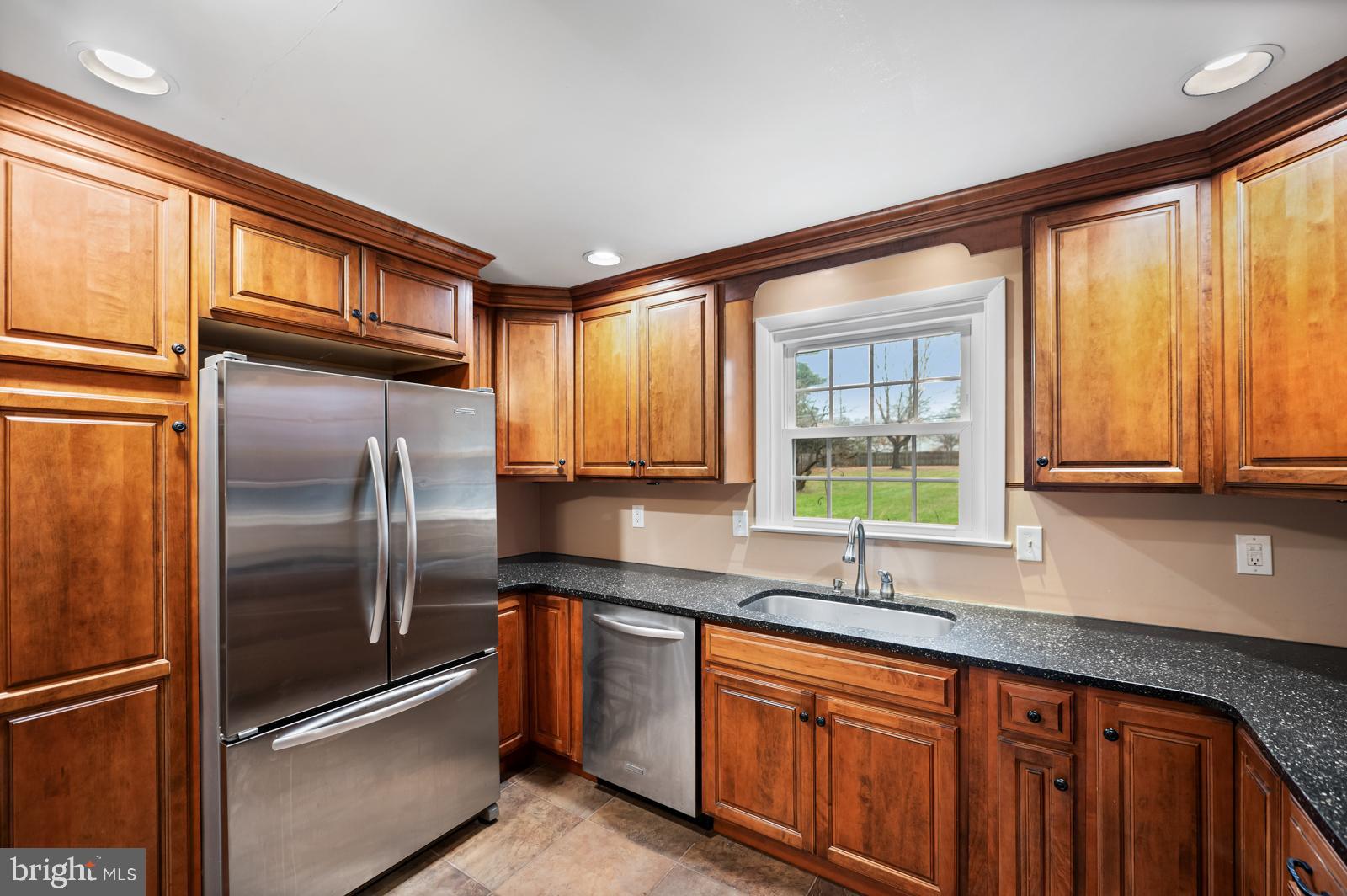 1122 Thomas Road Wayne, PA 19087 - Photo 10 of 31 Kitchen with View to Fenced in Backyard