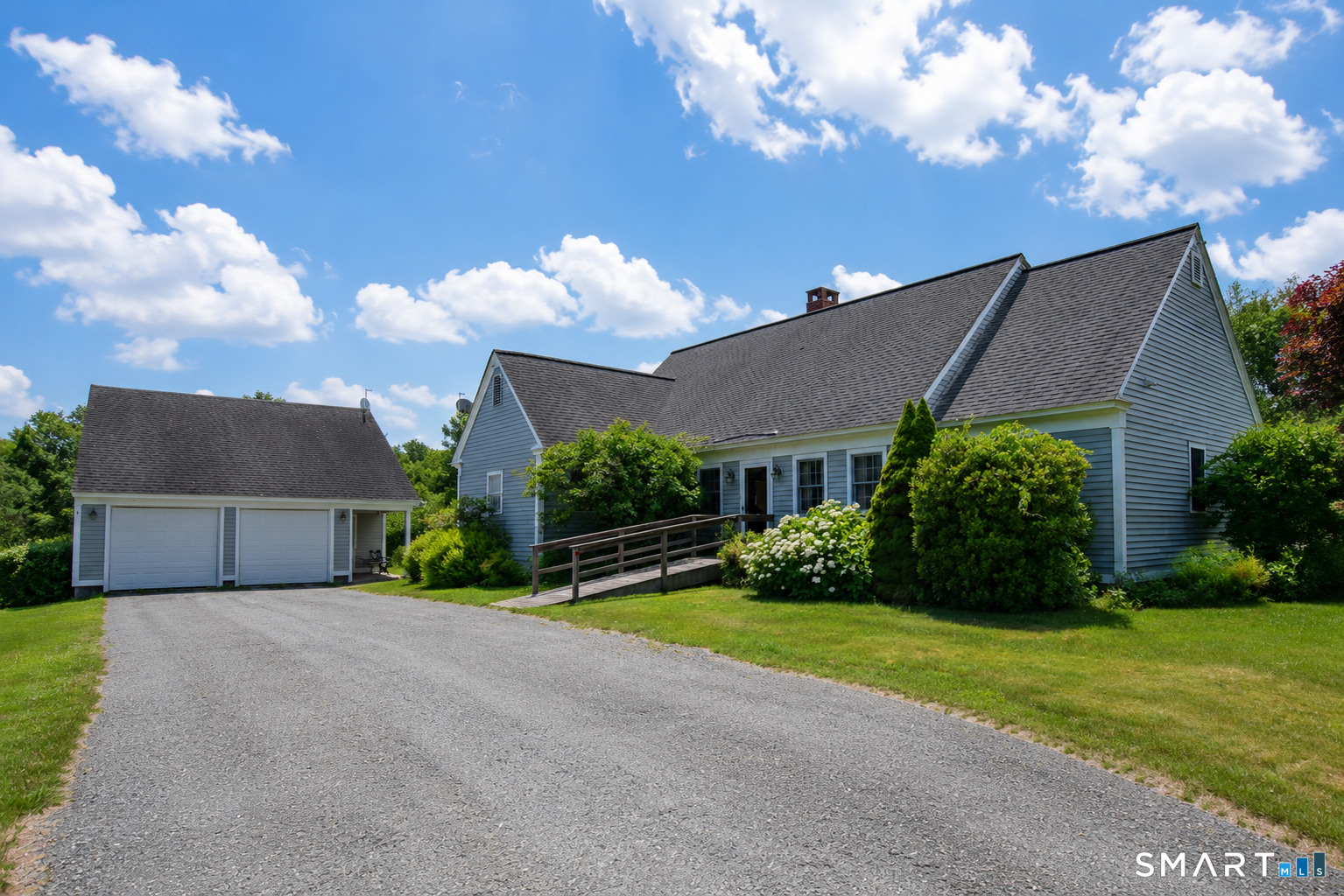 511 Perrin Road Woodstock, CT 06281 - Photo 1 of 40 Exceptional country estate gracefully set atop a private 3.5-acre hillside in scenic Woodstock, CT.