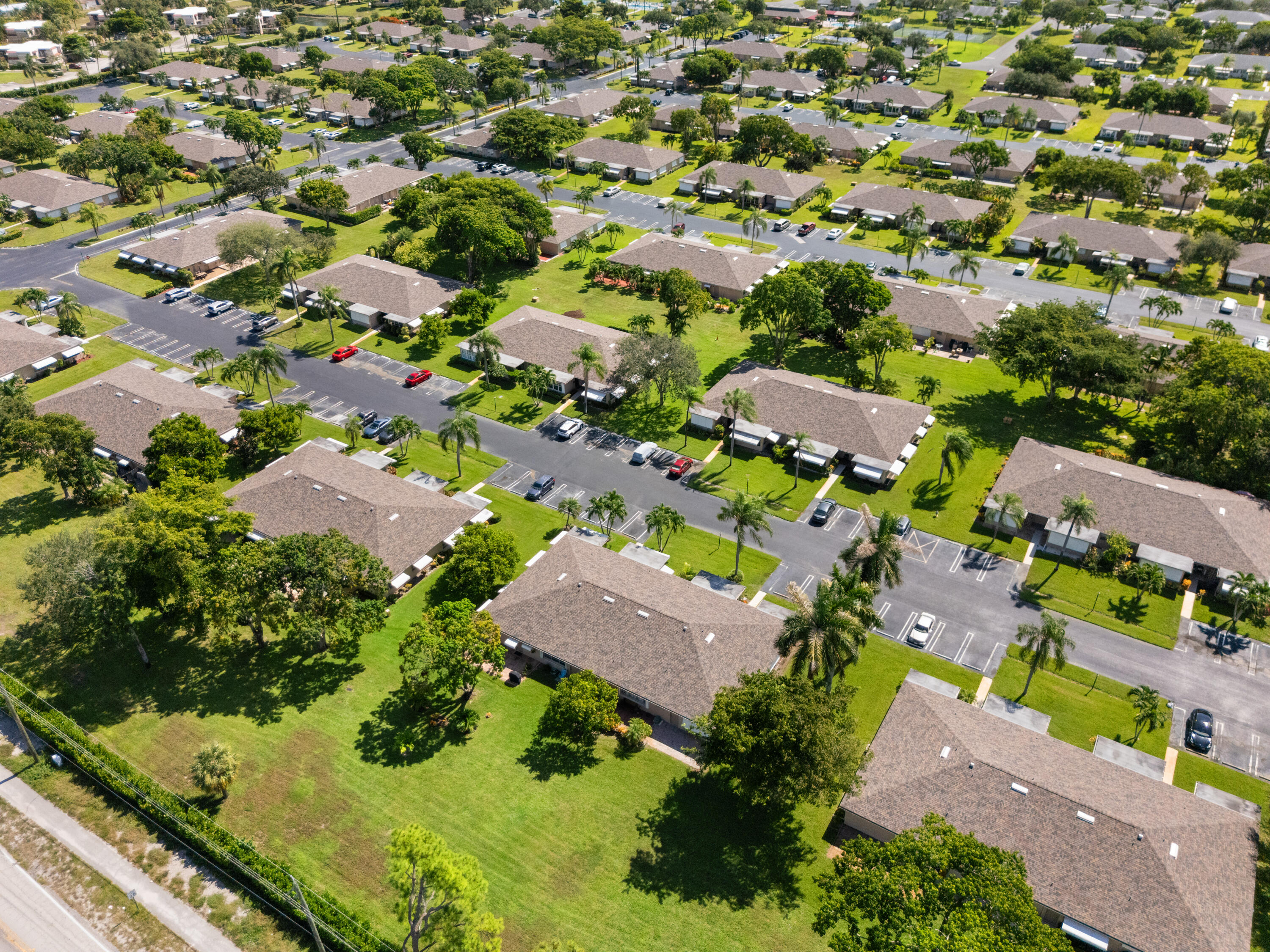 1402 High Point Way Southwest, Unit B Delray Beach, FL 33445 - Photo 39 of 40 DJI_20250820105941_0036_D