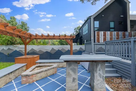swimming pool view with a seating space