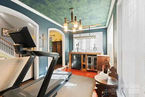 a kitchen with a stove and a refrigerator