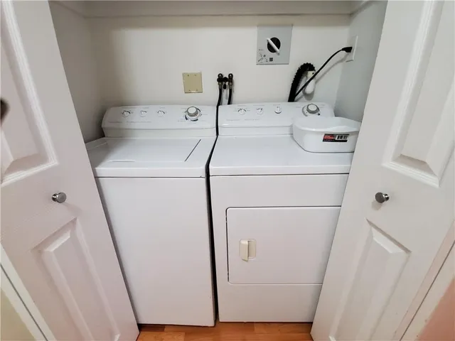 a utility room with dryer and washer