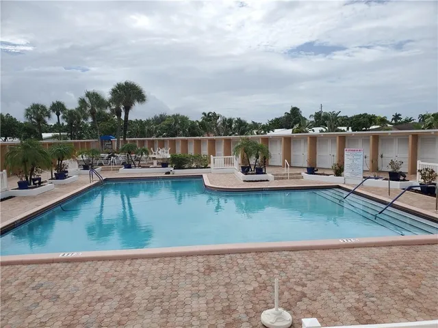 a view of a lake with boats