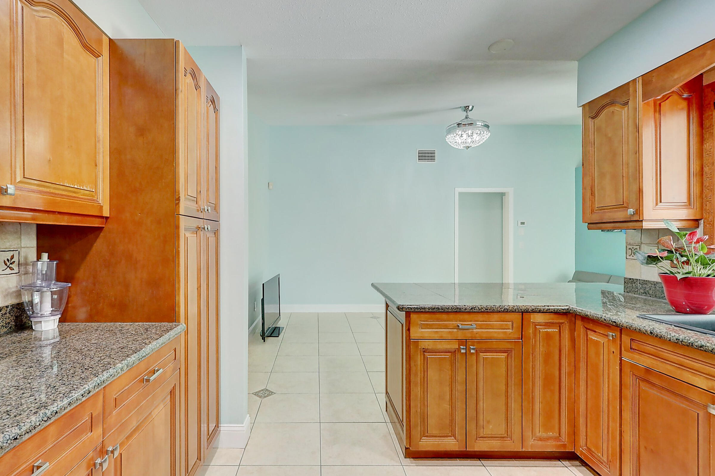 238 Southwest Grove Avenue Port St. Lucie, FL 34983 - Photo 14 of 47 a bathroom with a granite countertop sink and a mirror