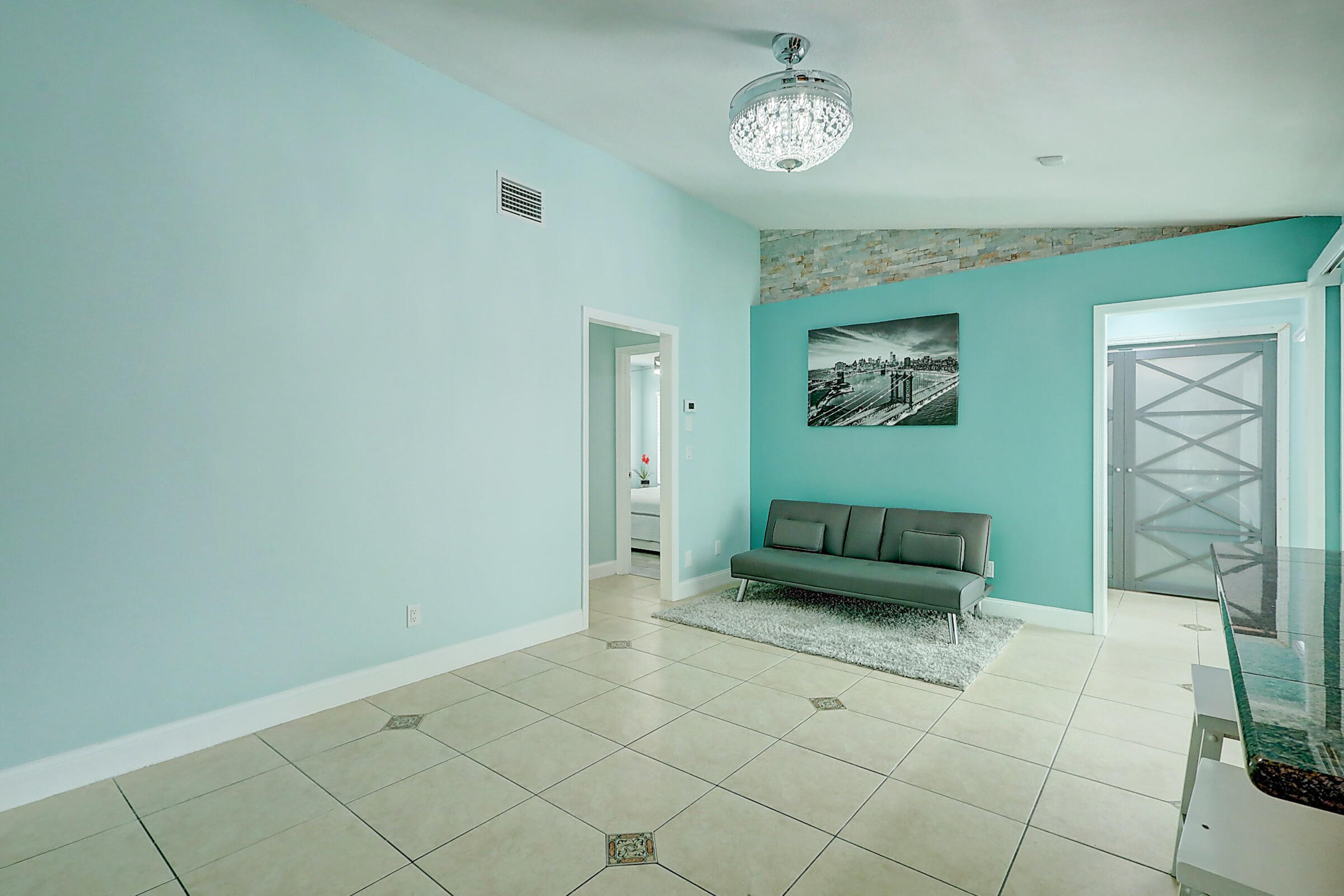 238 Southwest Grove Avenue Port St. Lucie, FL 34983 - Photo 24 of 47 a view of an entryway with a workspace