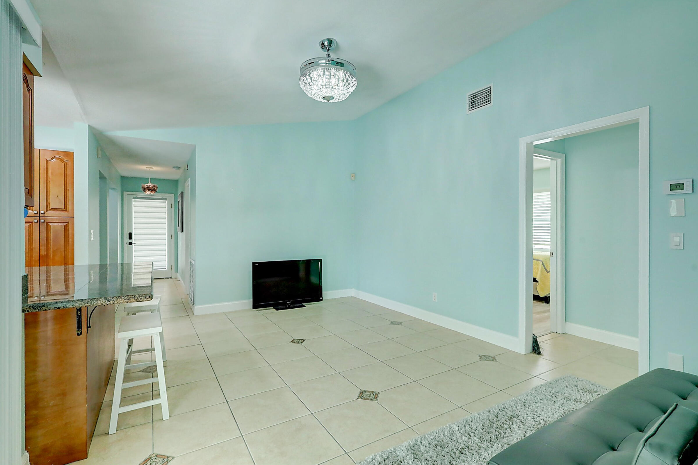 238 Southwest Grove Avenue Port St. Lucie, FL 34983 - Photo 26 of 47 a view of a livingroom with furniture