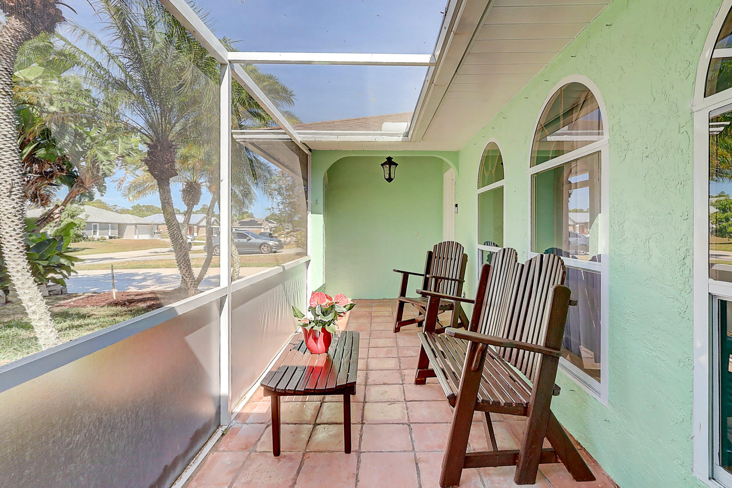 238 Southwest Grove Avenue Port St. Lucie, FL 34983 - Photo 45 of 47 a view of a dining room with furniture and a window
