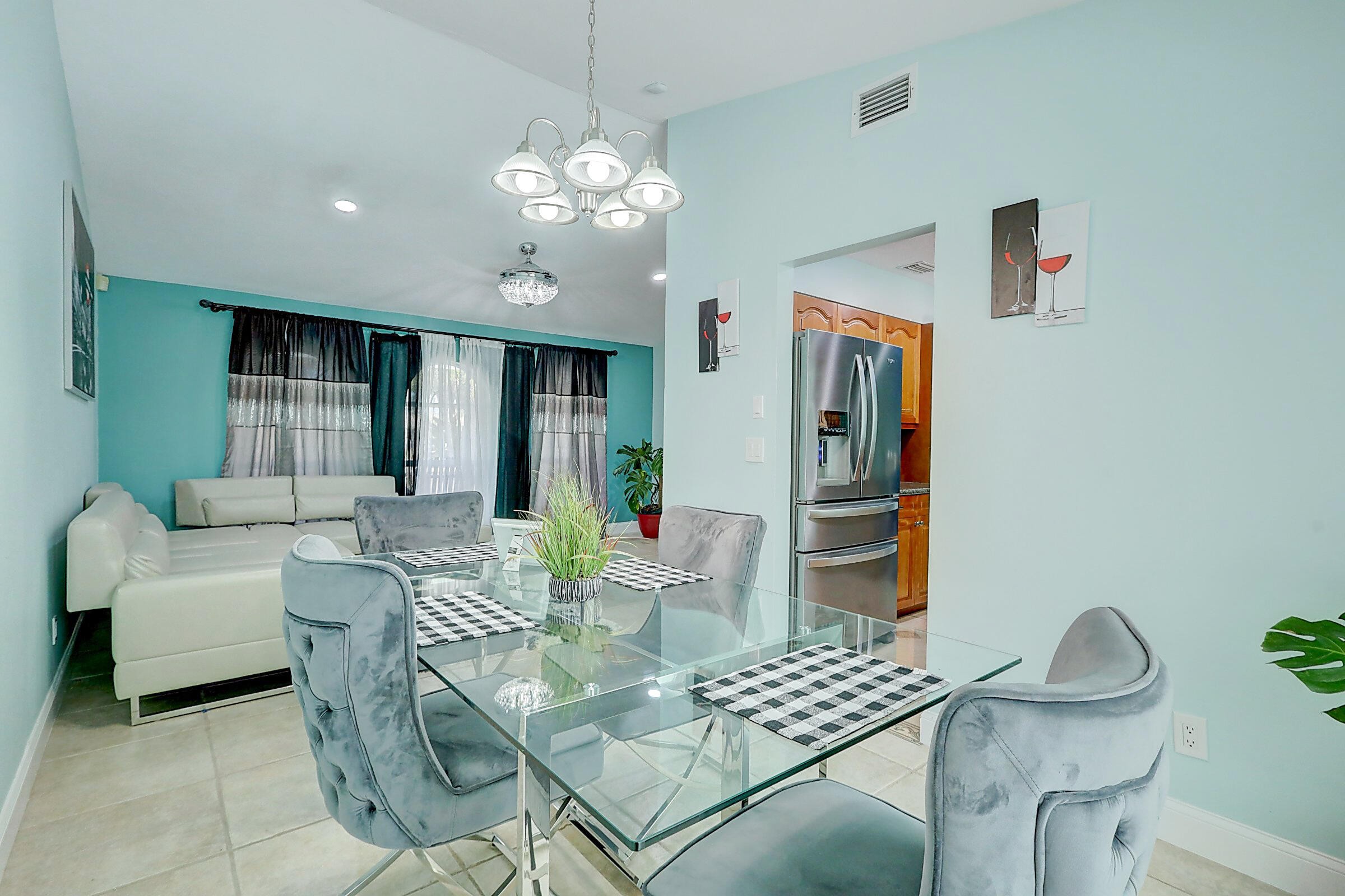 238 Southwest Grove Avenue Port St. Lucie, FL 34983 - Photo 10 of 47 a living room with furniture a table and chair