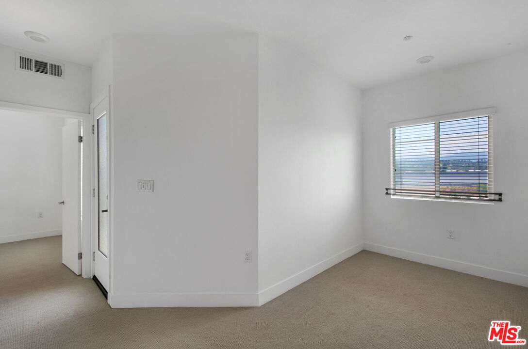 2974 Ripple Place, Unit 203 Los Angeles, CA 90039 - Photo 17 of 29 a view of a room that has a window in it