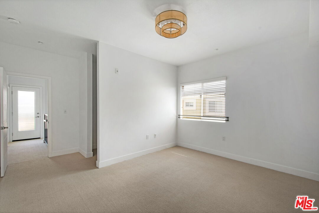 2974 Ripple Place, Unit 203 Los Angeles, CA 90039 - Photo 22 of 29 an empty room with a window