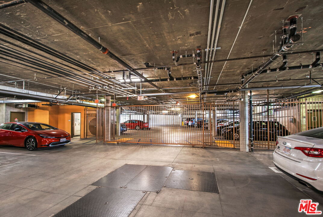 2974 Ripple Place, Unit 203 Los Angeles, CA 90039 - Photo 26 of 29 a view of parking garage with cars
