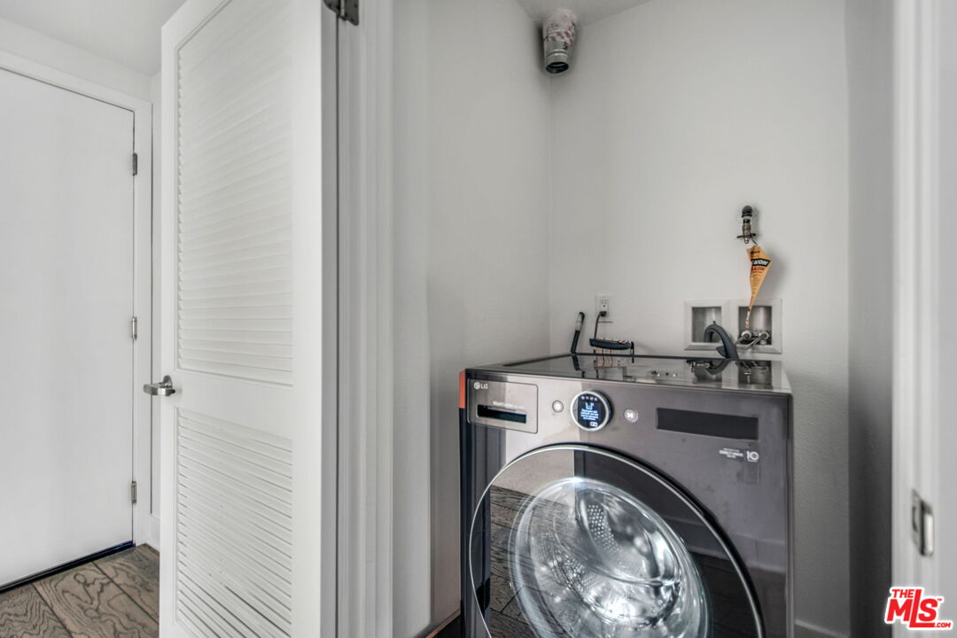 2974 Ripple Place, Unit 203 Los Angeles, CA 90039 - Photo 8 of 29 a utility room with dryer and washer