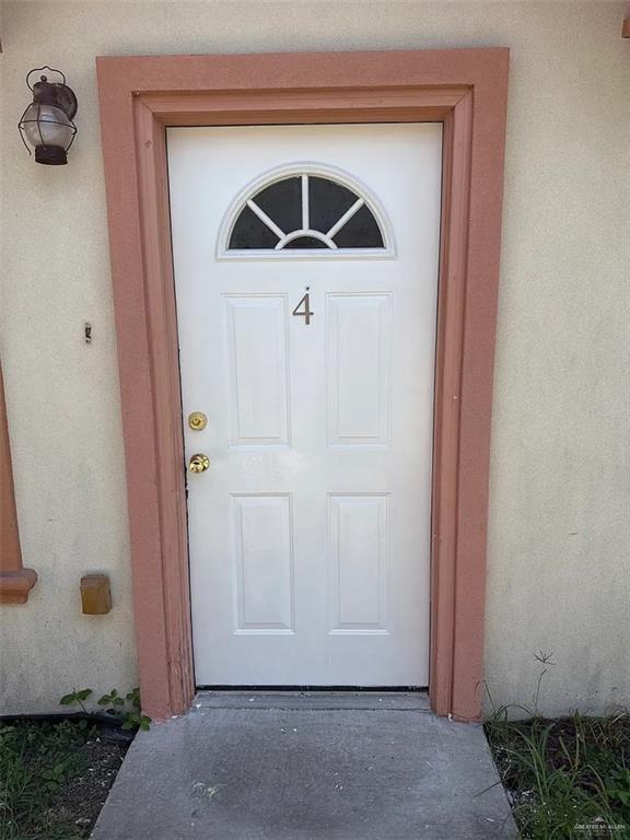 a front view of a house with a gate
