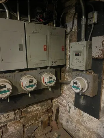 a view of a room with wooden walls