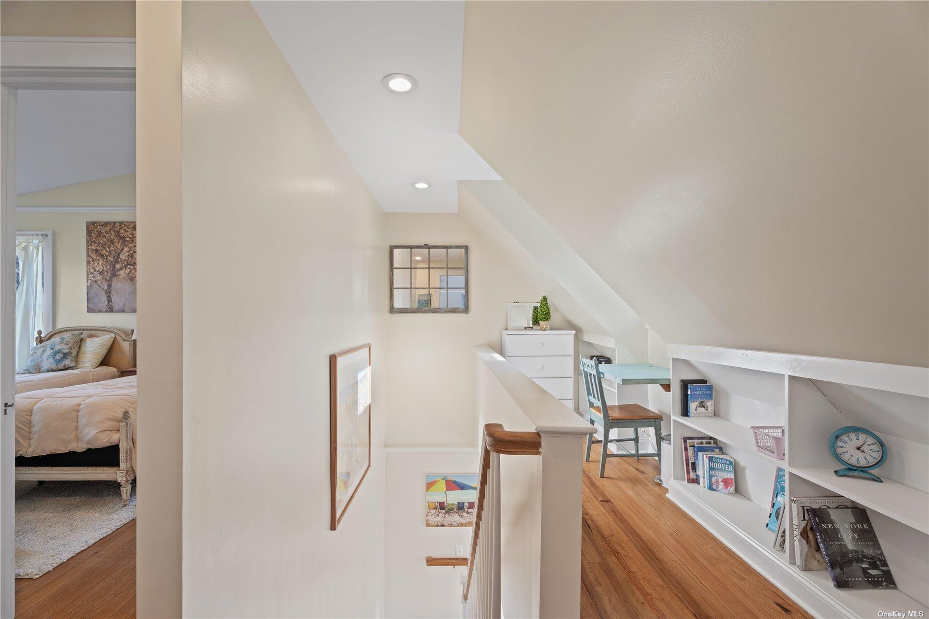 21 Summit Boulevard Westhampton, NY 11977 - Photo 13 of 28 a living room with furniture and a flat screen tv