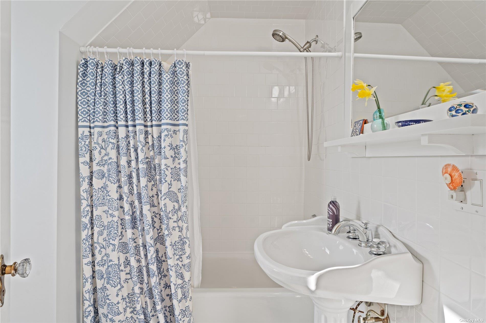 21 Summit Boulevard Westhampton, NY 11977 - Photo 15 of 28 a bathroom with a sink vanity and shower