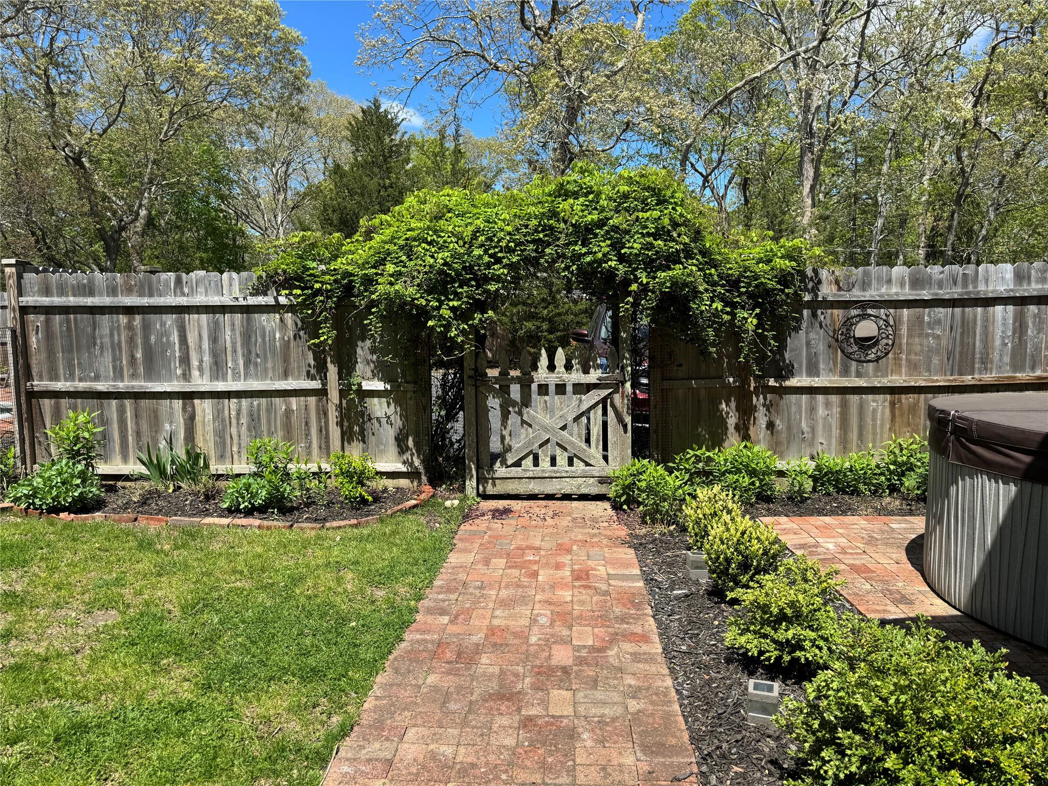 21 Summit Boulevard Westhampton, NY 11977 - Photo 27 of 28 front view of a house with a yard