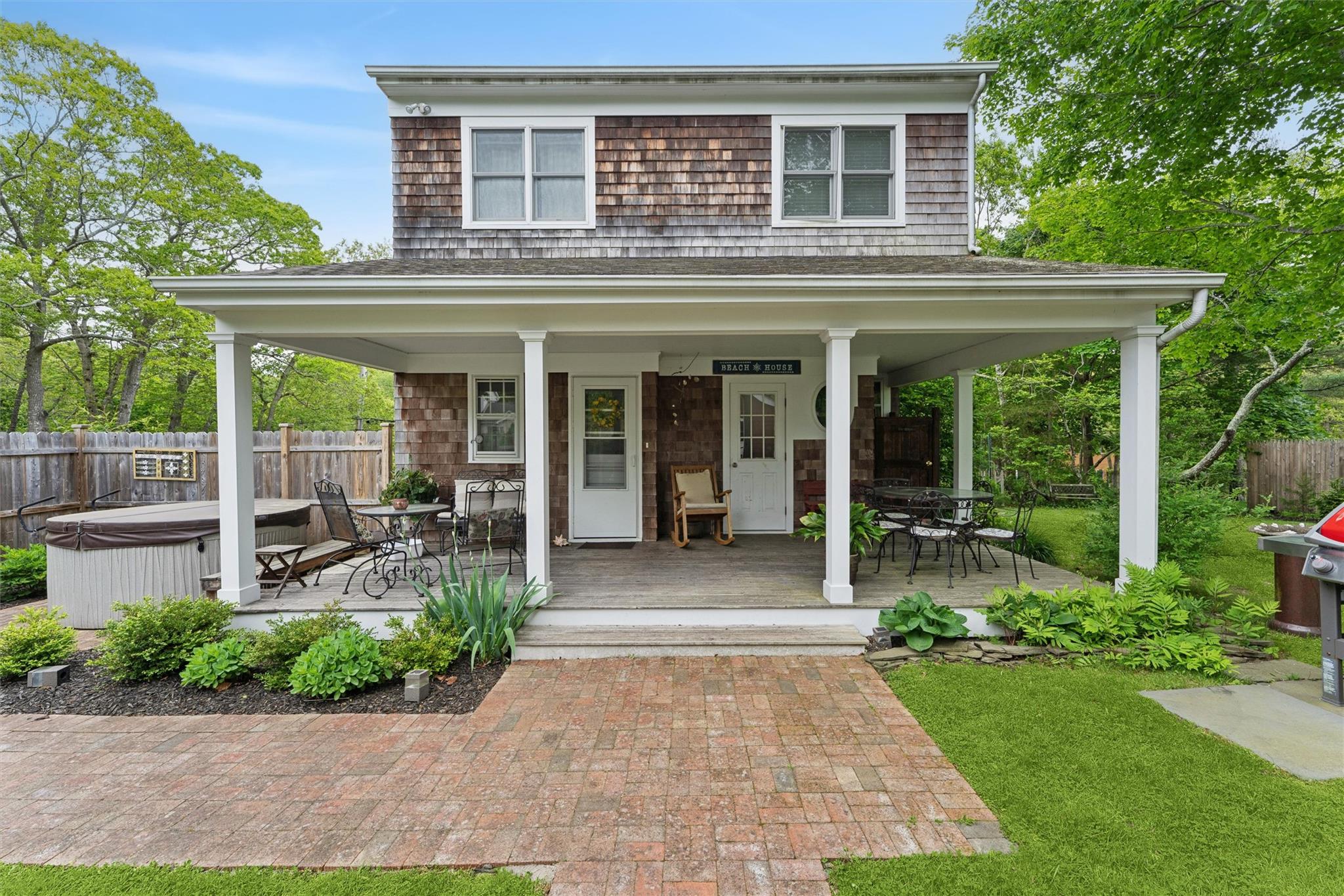 21 Summit Boulevard Westhampton, NY 11977 - Photo 3 of 28 a house view with a outdoor space