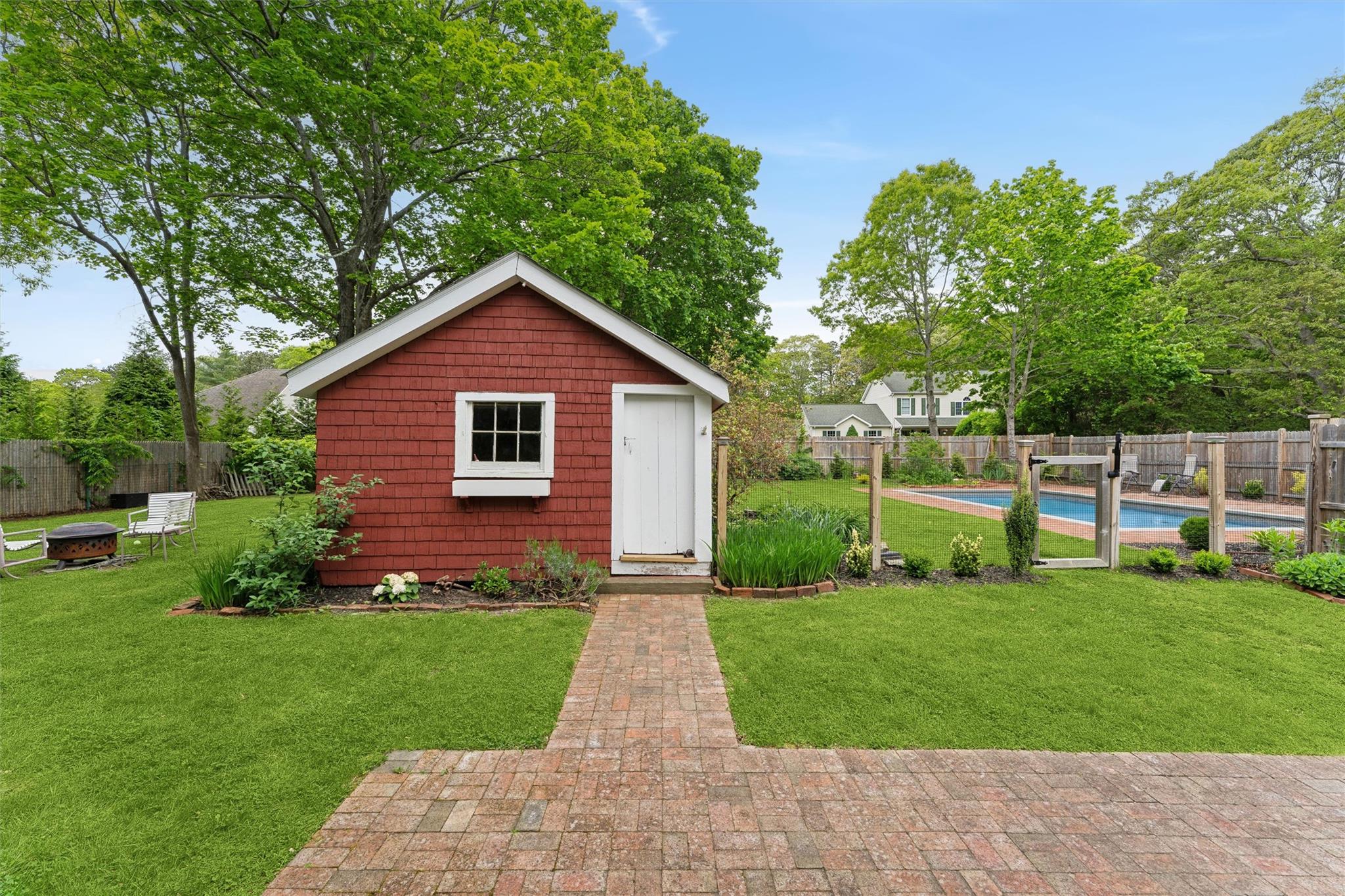 21 Summit Boulevard Westhampton, NY 11977 - Photo 4 of 28 a view of a house with garden