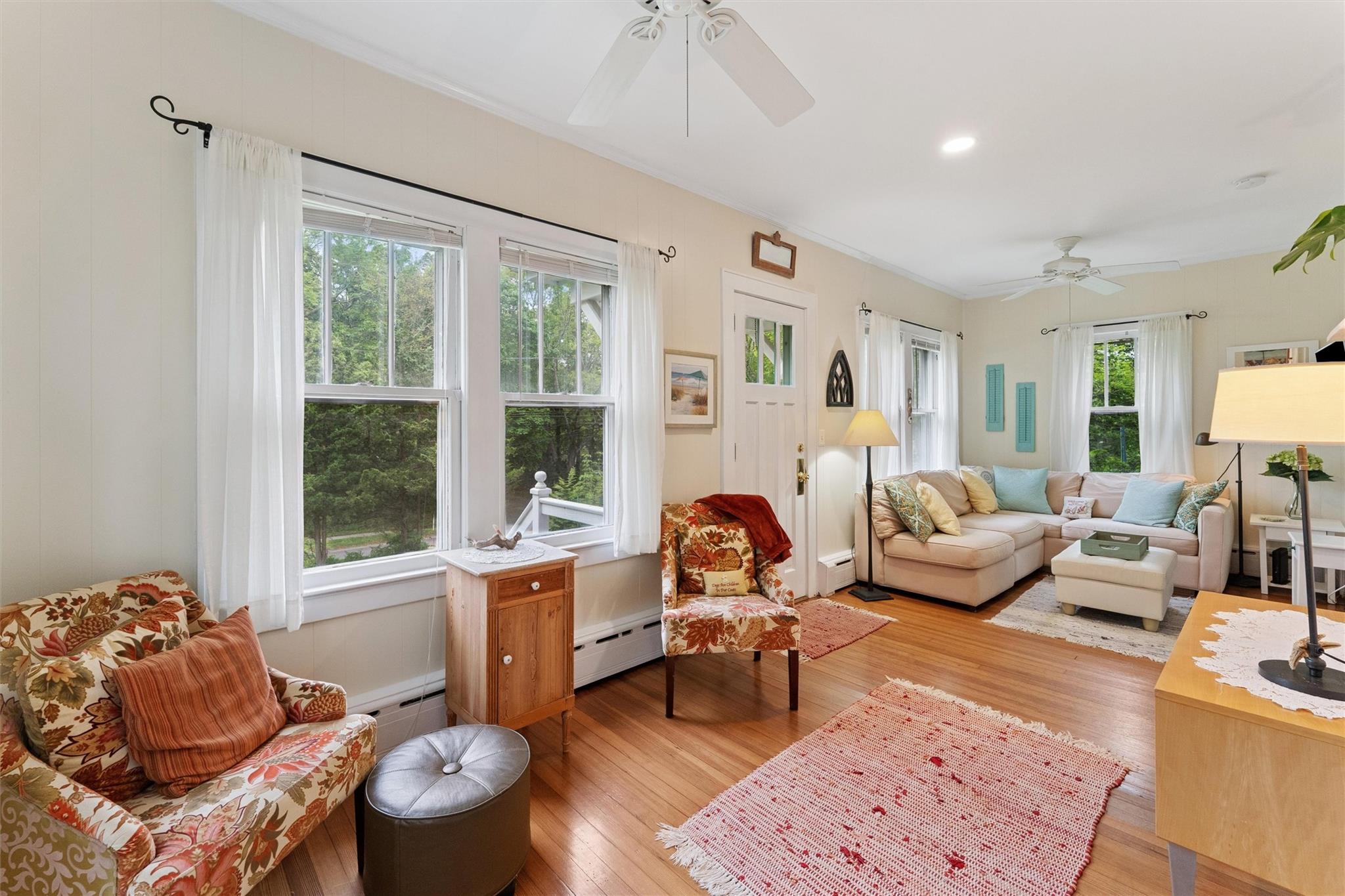 21 Summit Boulevard Westhampton, NY 11977 - Photo 5 of 28 a living room with furniture and a large window