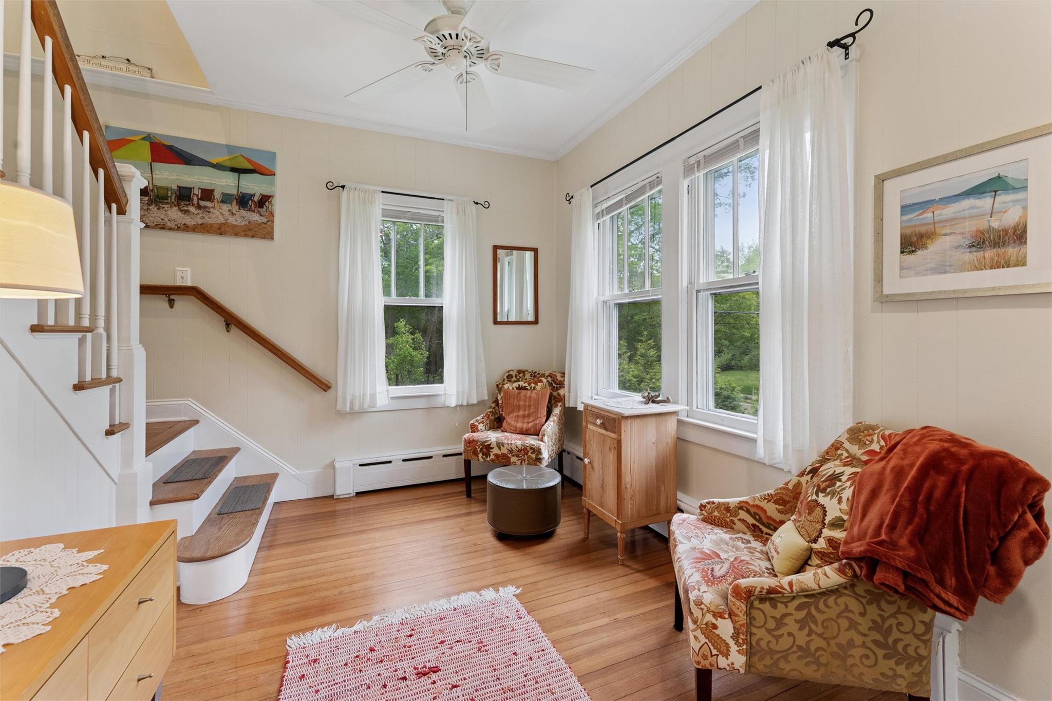 21 Summit Boulevard Westhampton, NY 11977 - Photo 7 of 28 a living room with furniture and a window