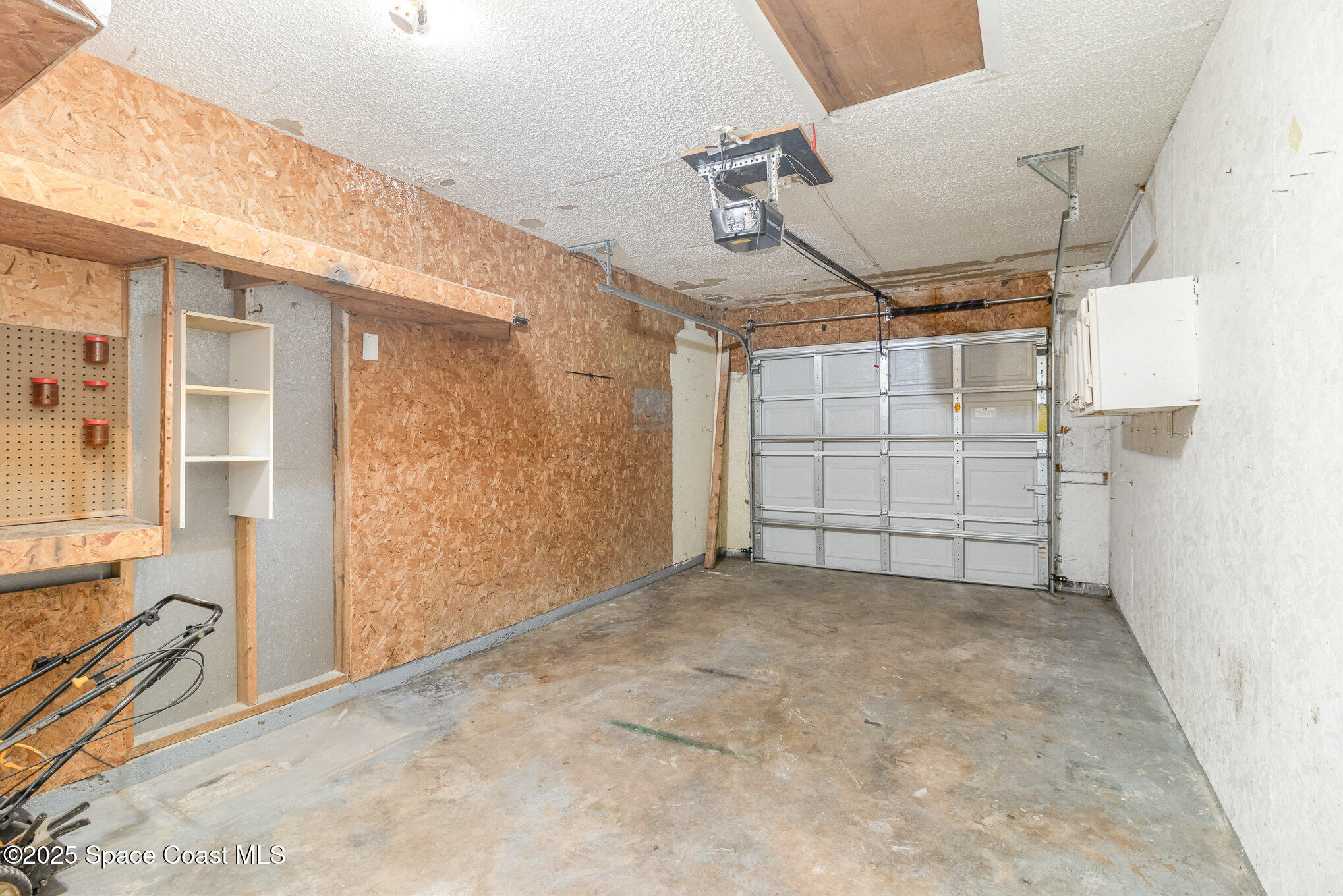 7413 Ester Road Cocoa, FL 32927 - Photo 21 of 30 a view of a garage
