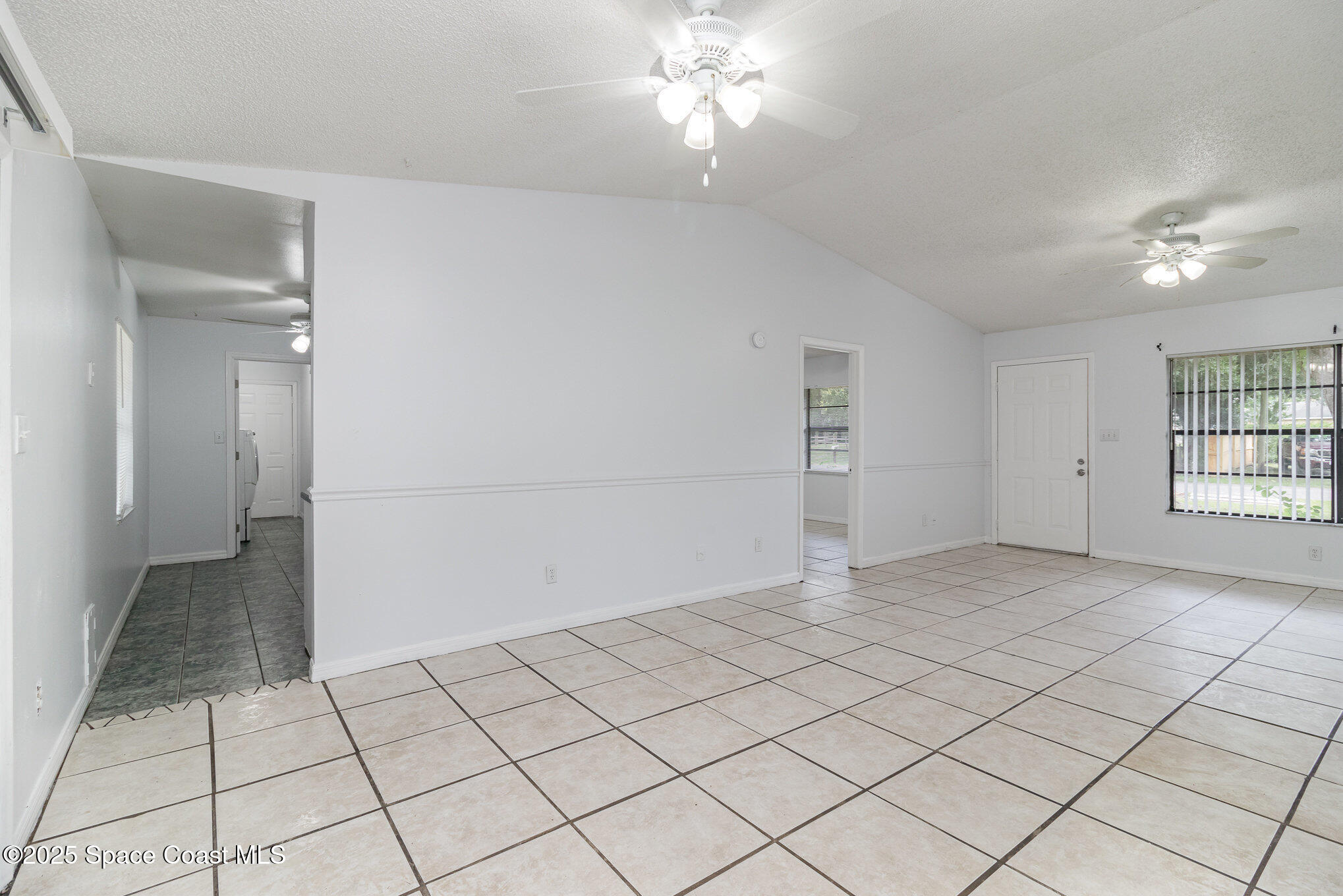 7413 Ester Road Cocoa, FL 32927 - Photo 5 of 30 a view of an empty room and window