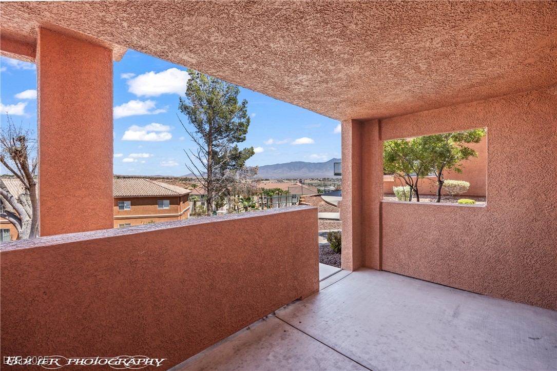 334 Colleen Court, Unit D Mesquite, NV 89027 - Photo 24 of 61 Patio / terrace featuring a mountain view