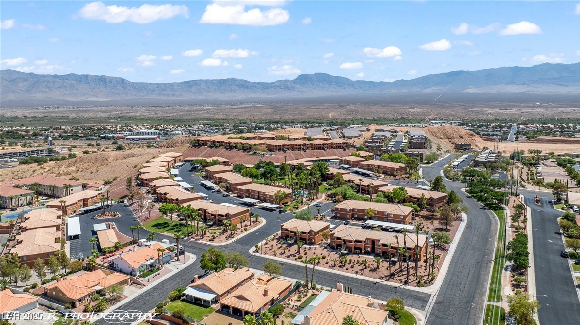 334 Colleen Court, Unit D Mesquite, NV 89027 - Photo 49 of 61 Aerial view of residential area featuring mountains
