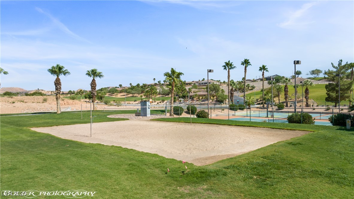 334 Colleen Court, Unit D Mesquite, NV 89027 - Photo 54 of 61 View of community featuring a lawn and volleyball court