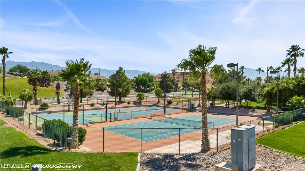 334 Colleen Court, Unit D Mesquite, NV 89027 - Photo 55 of 61 View of tennis court featuring a mountain view