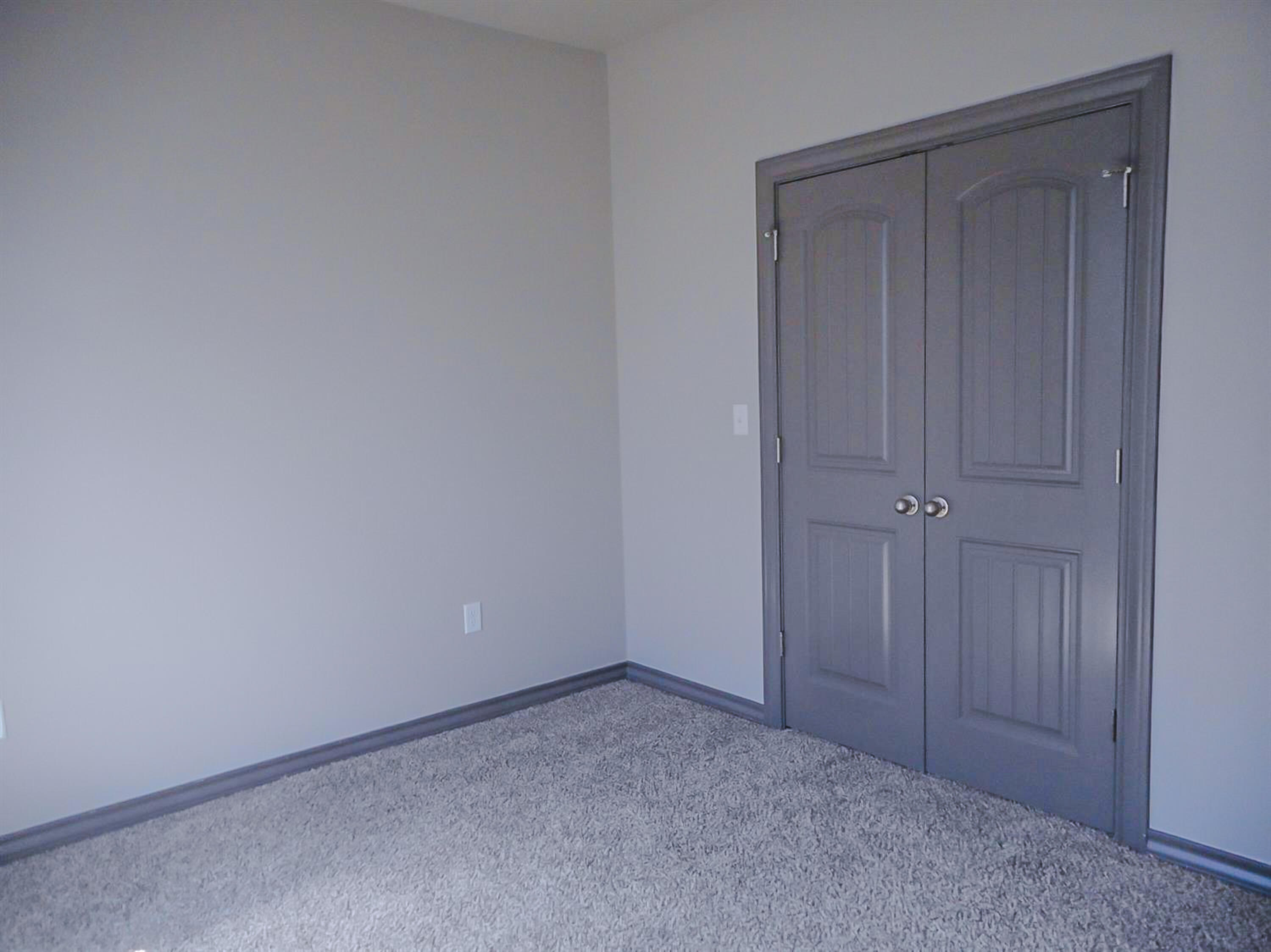 2026 102nd Street Lubbock, TX 79423 - Photo 15 of 16 a view of an empty room and closet area