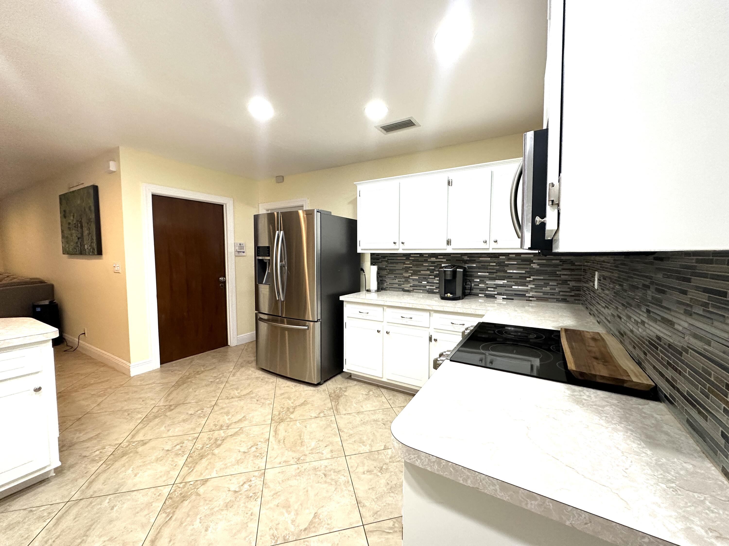 111 Timber Run West Riviera Beach, FL 33407 - Photo 34 of 126 9FA5D5E1-5689-45C9-811E-AD971DA40307