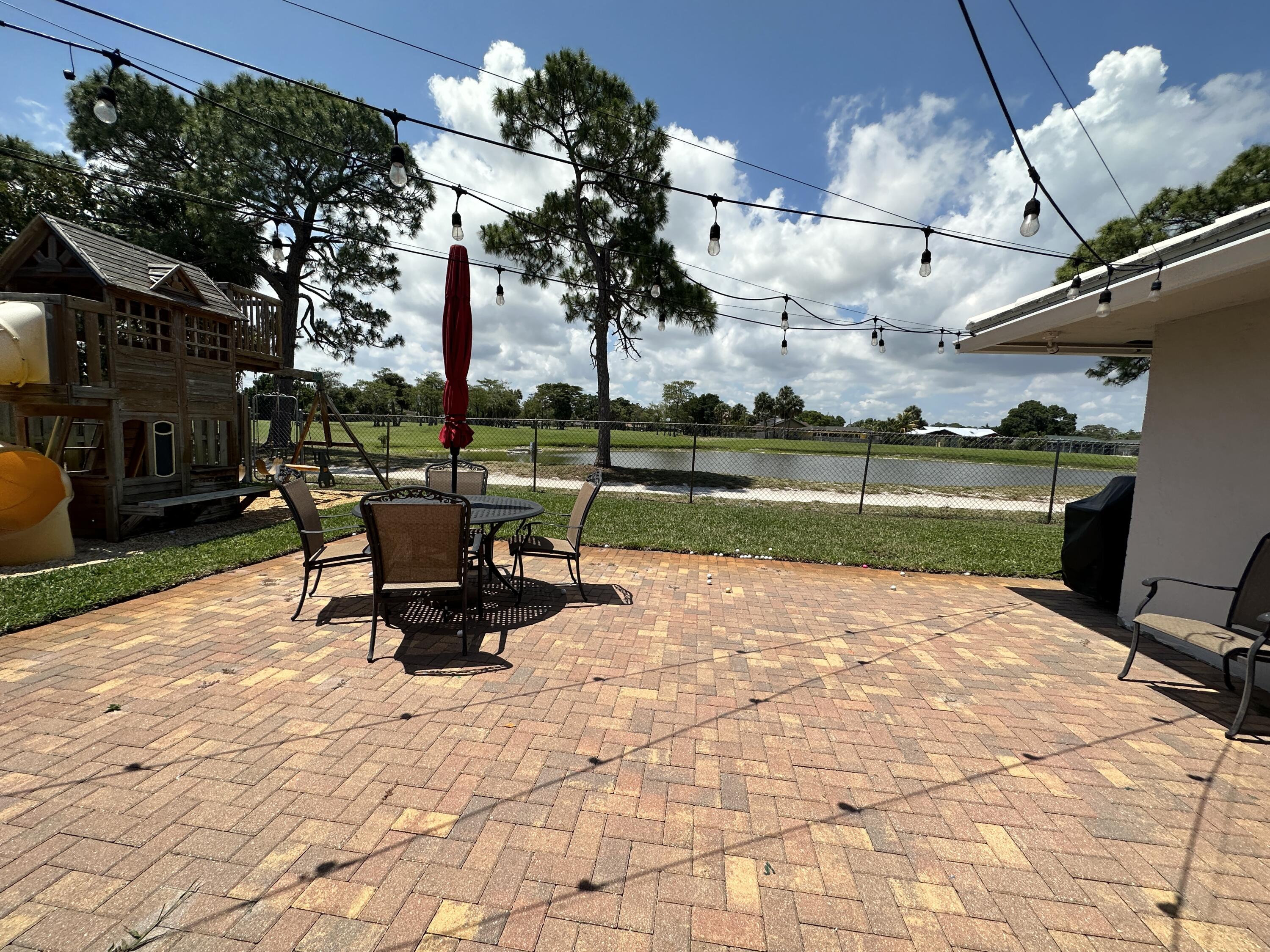 111 Timber Run West Riviera Beach, FL 33407 - Photo 8 of 126 8C2F9E08-0366-4AF7-BA5E-F370988637DC
