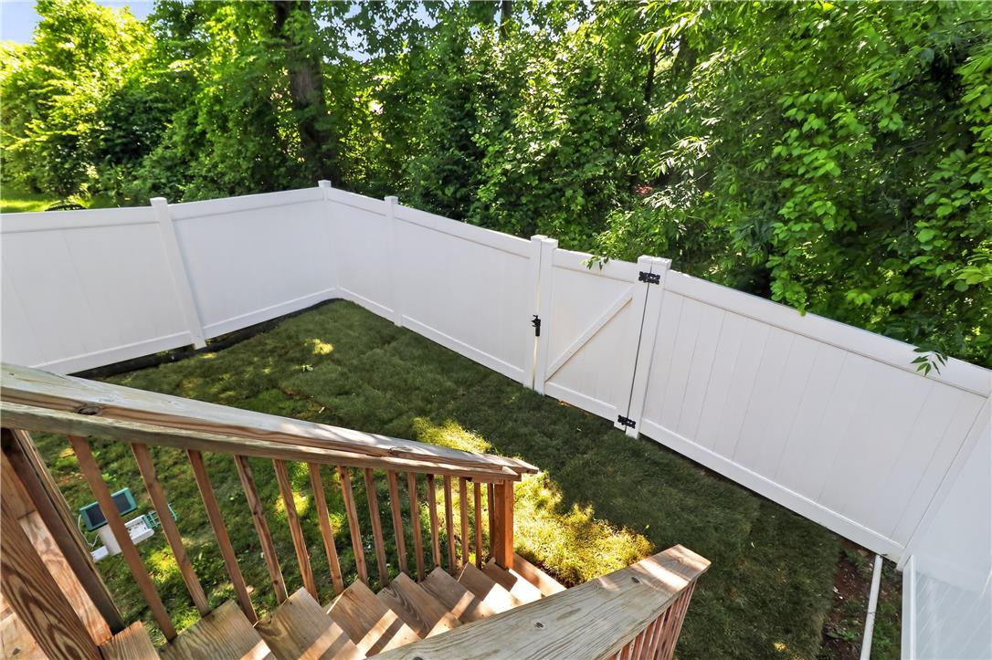 4502 Benjamin Court Emmaus, PA 18049 - Photo 19 of 48 A pristine fenced yard with a gate, offering secluded outdoor living.