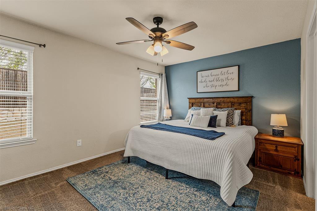 2440 Willard Way Forney, TX 75126 - Photo 13 of 25 a bedroom with a bed and window
