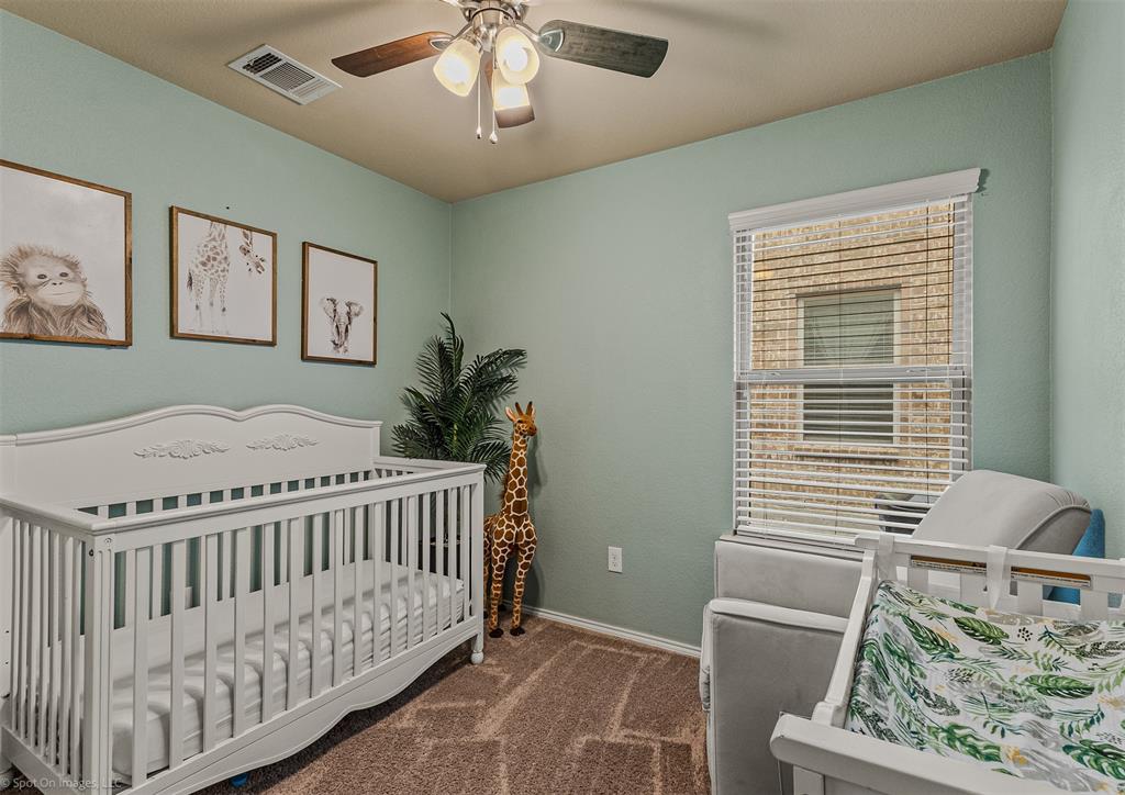 2440 Willard Way Forney, TX 75126 - Photo 16 of 25 a view of bedroom with furniture