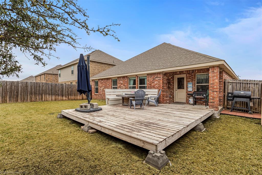 2440 Willard Way Forney, TX 75126 - Photo 24 of 25 a view of a dinning table and chairs in patio