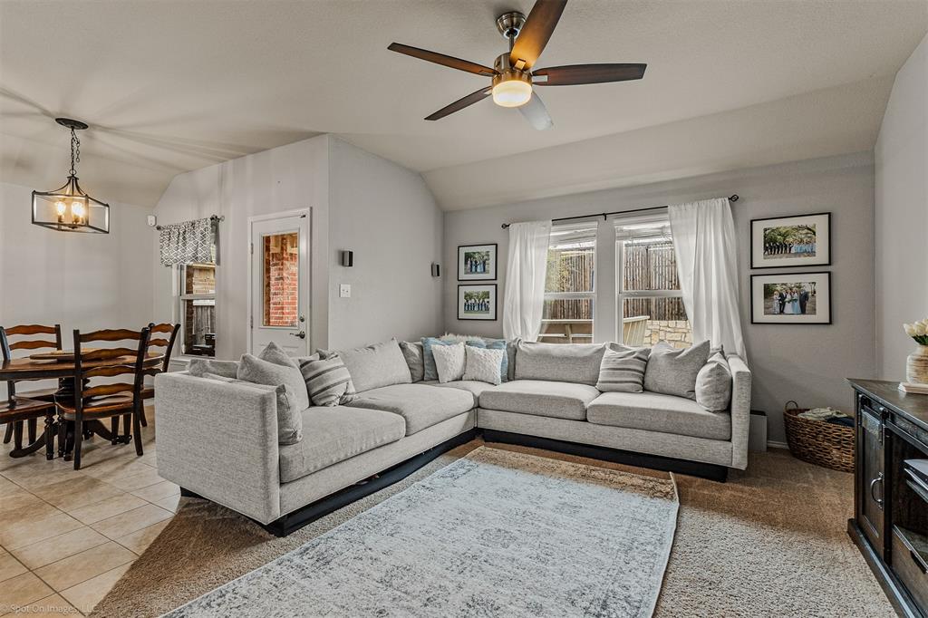 2440 Willard Way Forney, TX 75126 - Photo 7 of 25 a living room with furniture and a large window